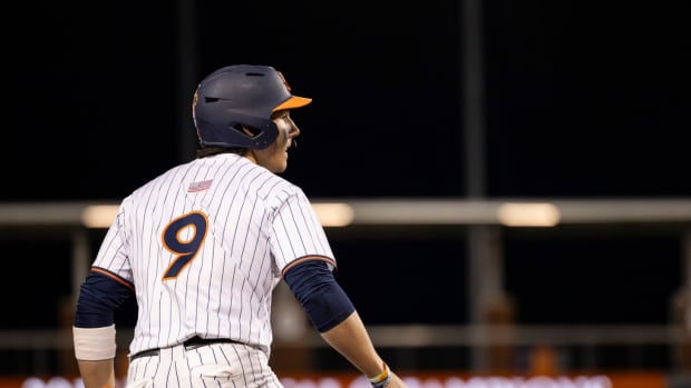 Henry Ford takes a lead off third base during the Virginia baseball game against VMI at Disharoon Park.